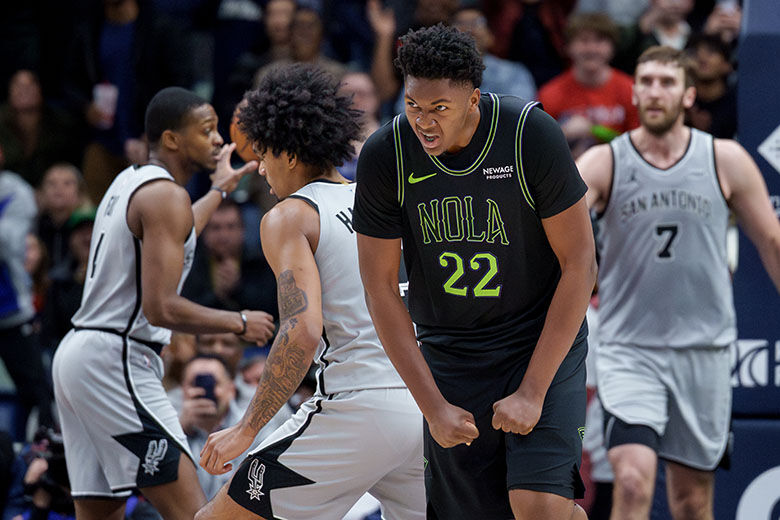 New Orleans Pelicans center Derik Queen (22) reacts after a score during the fourth quarter of an NBA basketball game against the San Antonio Spurs in New Orleans, Monday, Dec. 8, 2025. (AP Photo/Matthew Hinton)