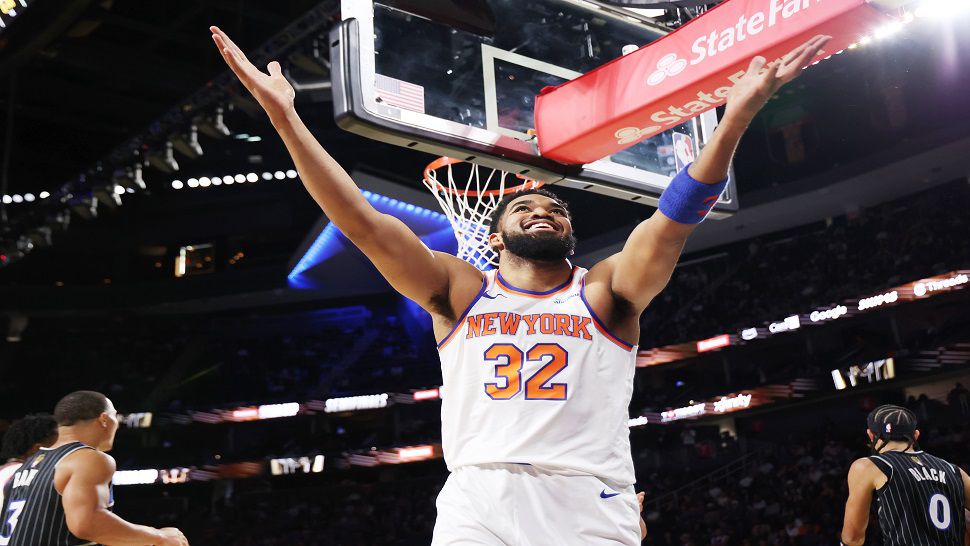 New York Knicks' center Karl-Anthony Towns (32) reacts to a call during the first half of an NBA Cup semifinals basketball game against Orlando Magic, Saturday, Dec. 13, 2025, in Las Vegas. (AP Photo/Ronda Churchill)