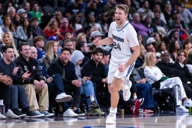 Memphis Grizzlies guard Cam Spencer (24) reacts during the second half of an NBA basketball game against the Los Angeles Clippers, Monday, Dec. 15, 2025, in Inglewood, Calif. (AP Photo/Ethan Swope)