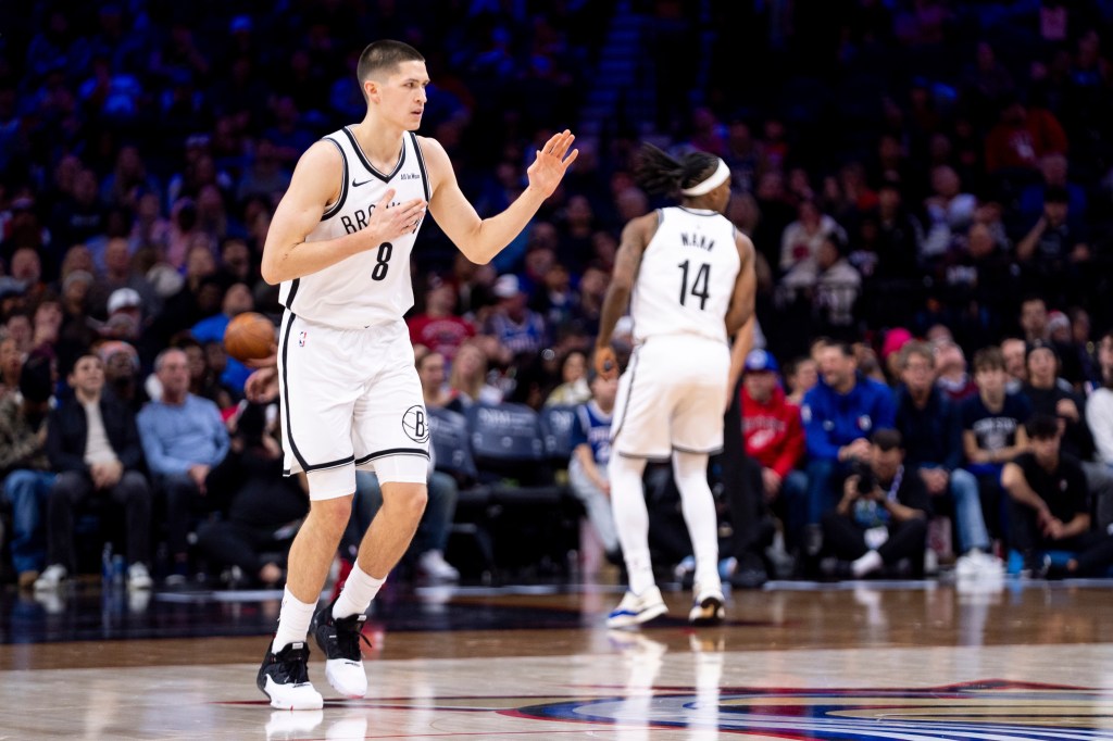 Brooklyn Nets' Egor Demin reacts to the three-point basket during the second half of an NBA basketball game against the Philadelphia 76ers, Tuesday, Dec. 23, 2025, in Philadelphia. 