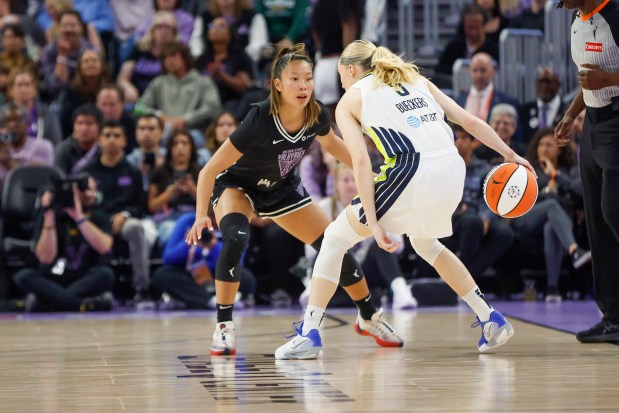 Dallas Wings' Paige Bueckers (5) dribbles the ball against Valkyries' Kaitlyn Chen (2) in the second quarter at the Chase Center in San Francisco, Calif., on Saturday, July 25, 2025. (Shae Hammond/Bay Area News Group)