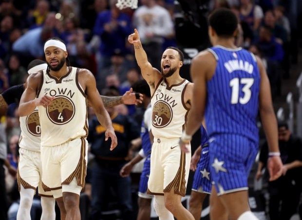 Golden State Warriors' Stephen Curry #30 celebrates in the second half of their NBA game against the Orlando Magic at the Chase Center in San Francisco, Calif., on Monday, Dec. 22, 2025. (Jane Tyska/Bay Area News Group)