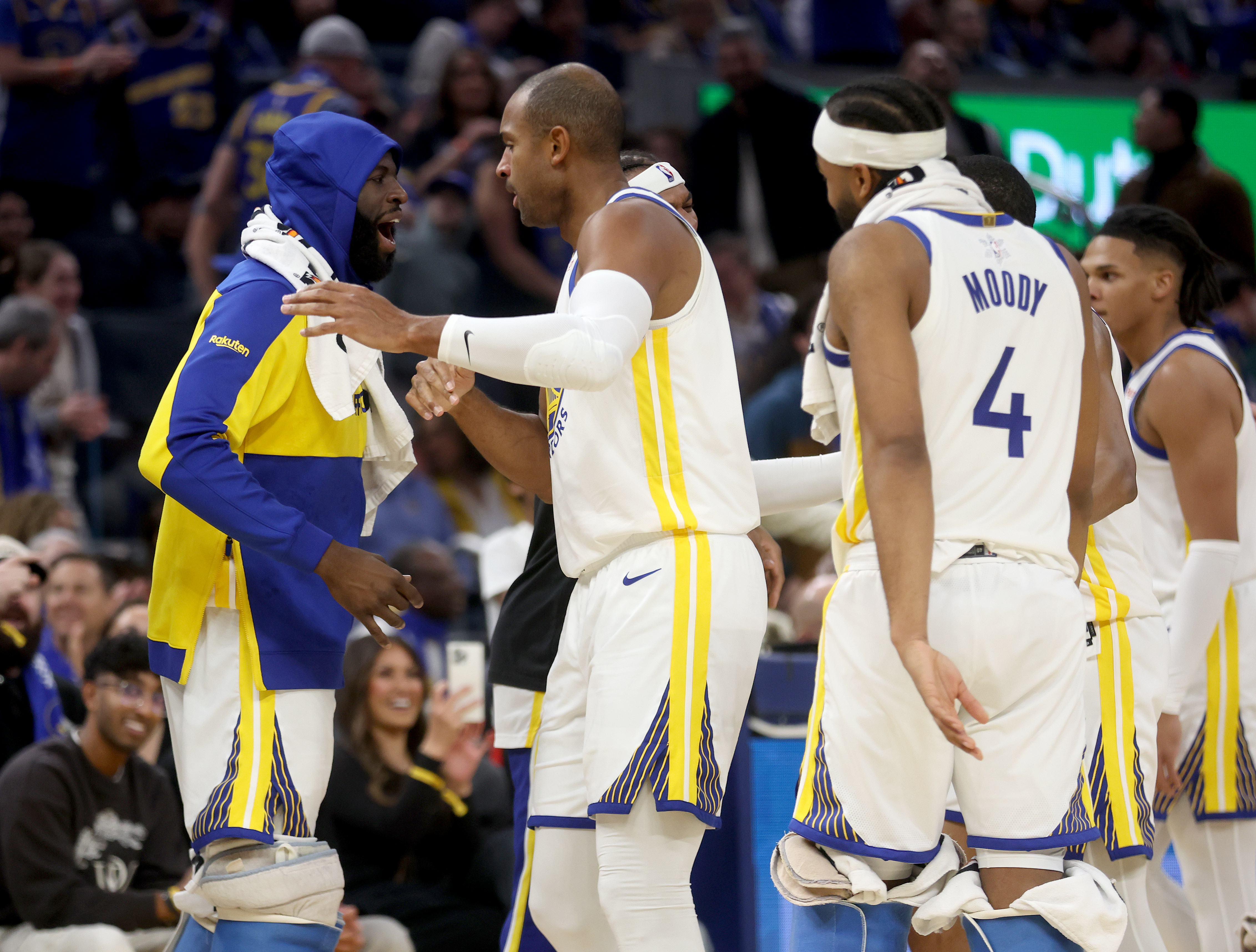 Golden State Warriors’ Al Horford #20 is congratulated by Draymond...
