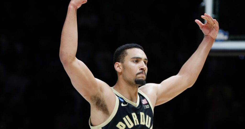 Purdue Boilermakers forward Trey Kaufman-Renn (4) pumps up the crowd Saturday, March 29, 2025, during the NCAA Tournament Sweet 16 game against the Houston Cougars at Lucas Oil Stadium in Indianapolis. Houston Cougars won 62-60. © Alex Martin/Journal and Courier / USA TODAY NETWORK via Imagn Images