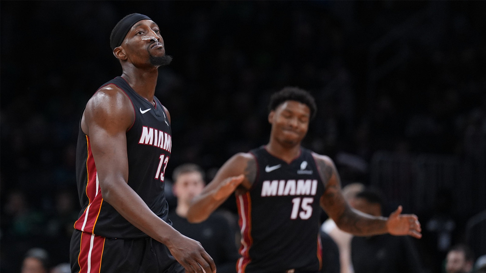 Miami Heat center Bam Adebayo (13) walks to the sideline during a break against the Boston Celtics in the second half at TD Garden.