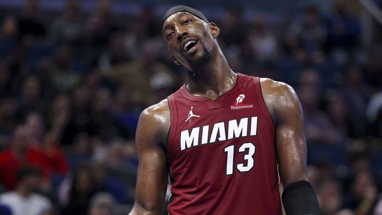 Miami Heat center Bam Adebayo (13) reacts after a call against the Orlando Magic in the fourth quarter at Kia Center.