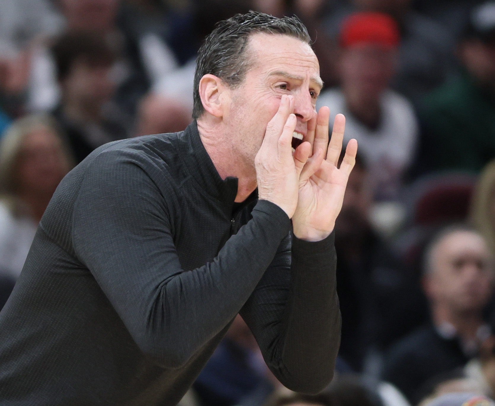 Cleveland Cavaliers head coach Kenny Atkinson calls out an offensive play in the second half at Rocket Arena.