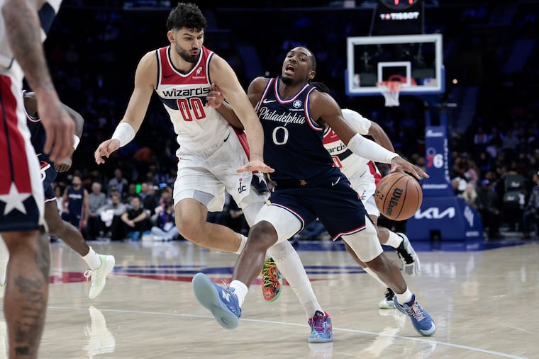 Tyrese Maxey (right) led the Sixers with 35 points against the Wizards.