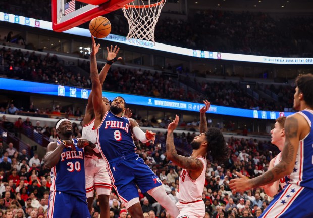 Philadelphia 76ers forward Paul George (8) goes up for a layup in the fourth quarter during a game against the Bulls, Friday, Dec. 26, 2025, at the United Center in Chicago. (Dominic Di Palermo/Chicago Tribune)