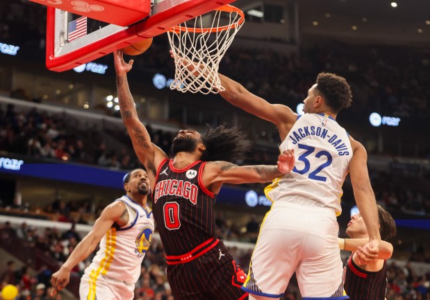 Chicago Bulls guard Coby White goes up for a layup in the third quarter during a game against the Golden State Warriors, Sunday, Dec. 7, 2025, at the United Center in Chicago. (Dominic Di Palermo/Chicago Tribune)