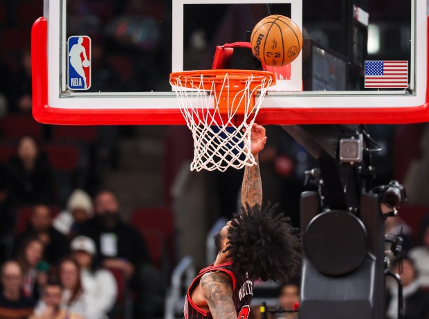 Chicago Bulls guard Coby White makes a layup in the first quarter during a game against the Golden State Warriors, Sunday, Dec. 7, 2025, at the United Center in Chicago. (Dominic Di Palermo/Chicago Tribune)