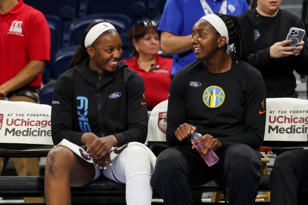 Chicago Sky forward Michaela Onyenwere, left, speaks to center Elizabeth Williams before the game against the Atlanta Dream at Wintrust Arena on Wednesday, July 16, 2025. (Eileen T. Meslar/Chicago Tribune)