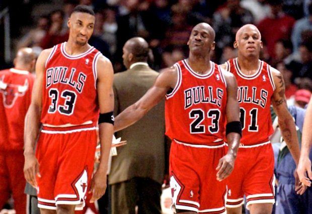 Bull stars Scottie Pippen, from left, Michael Jordan and Dennis Rodman head out to the court for the second half during a game against the Bucks on April 16, 1996, at the Bradley Center in Milwaukee. (Jim Prisching/Chicago Tribune)