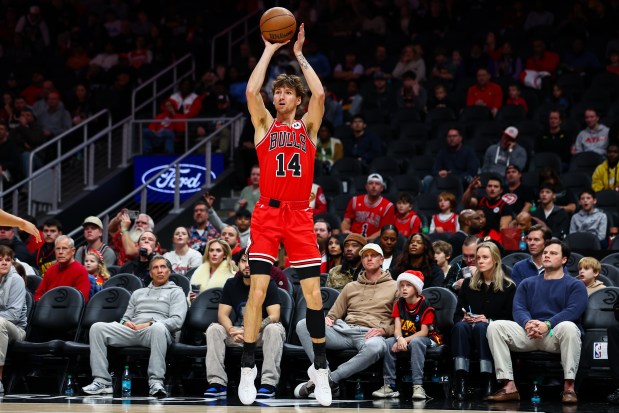 Chicago Bulls forward Matas Buzelis shoots during the first half of an NBA basketball game against the Atlanta Hawks, Sunday, Dec. 21, 2025, in Atlanta. (AP Photo/Colin Hubbard)