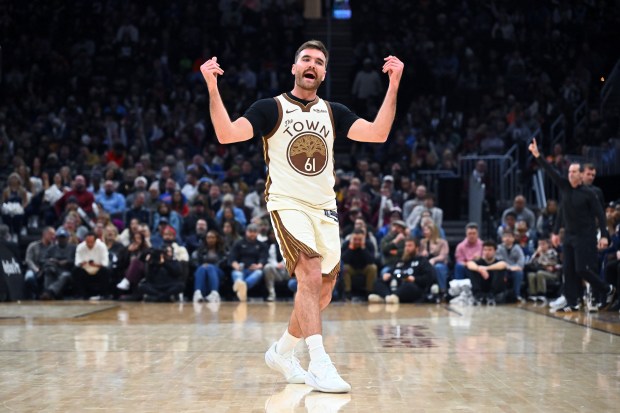 Warriors guard Pat Spencer reacts after making a basket during the fourth quarter against the Cavaliers on Saturday, Dec. 06, 2025, in Cleveland. (Jason Miller/Getty Images)