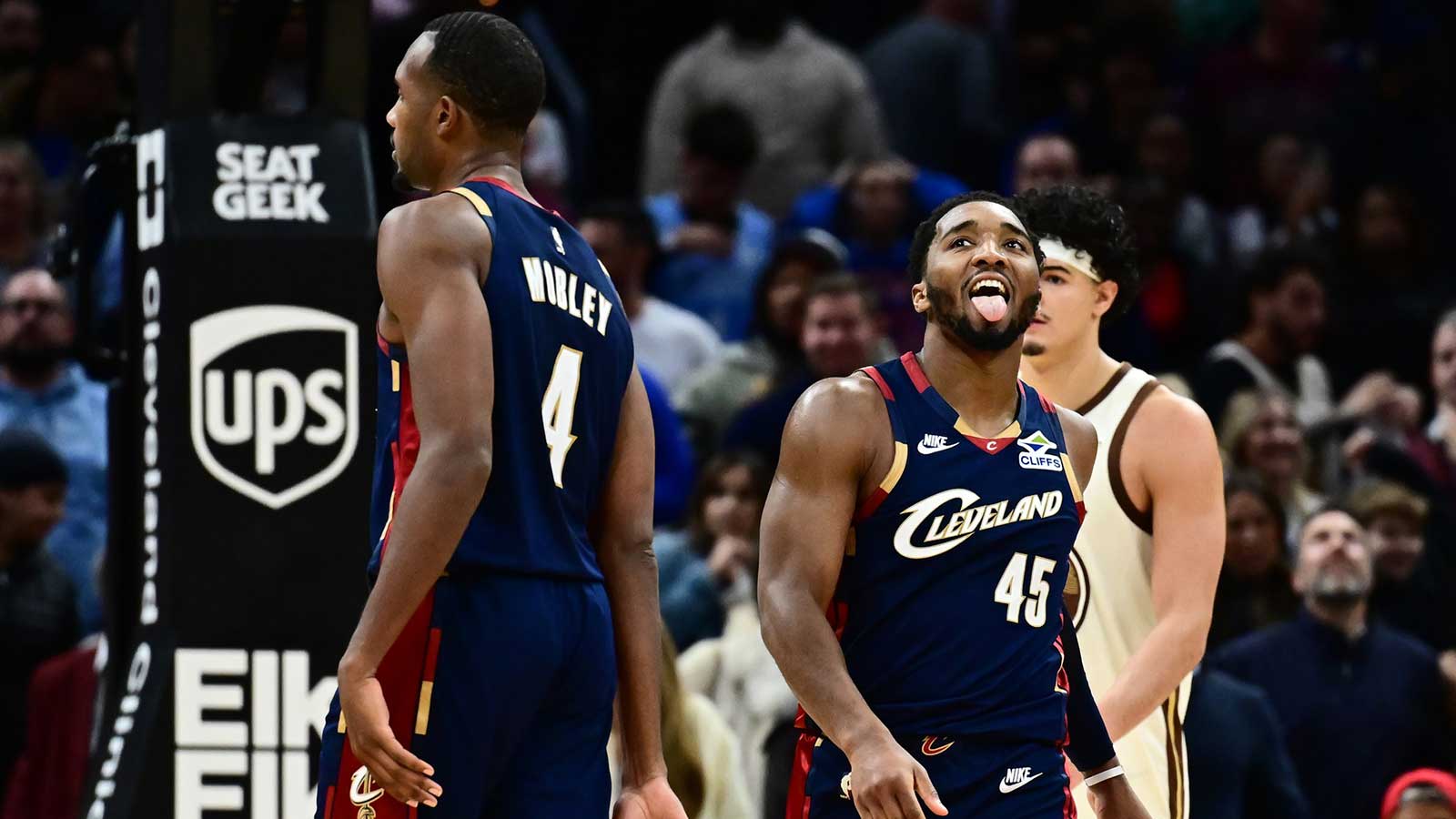 Cavaliers guard Donovan Mitchell (45) reacts after missing a shot during the fourth quarter against the Golden State Warriors at Rocket Arena