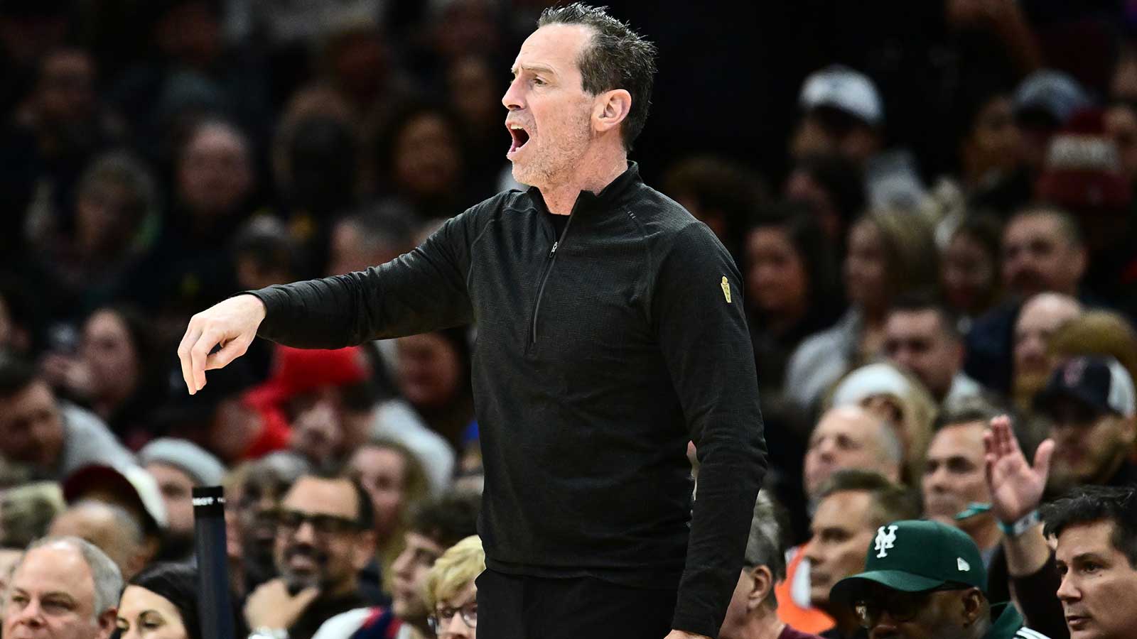 Cleveland Cavaliers head coach Kenny Atkinson reacts against the Golden State Warriors during the second half at Rocket Arena.