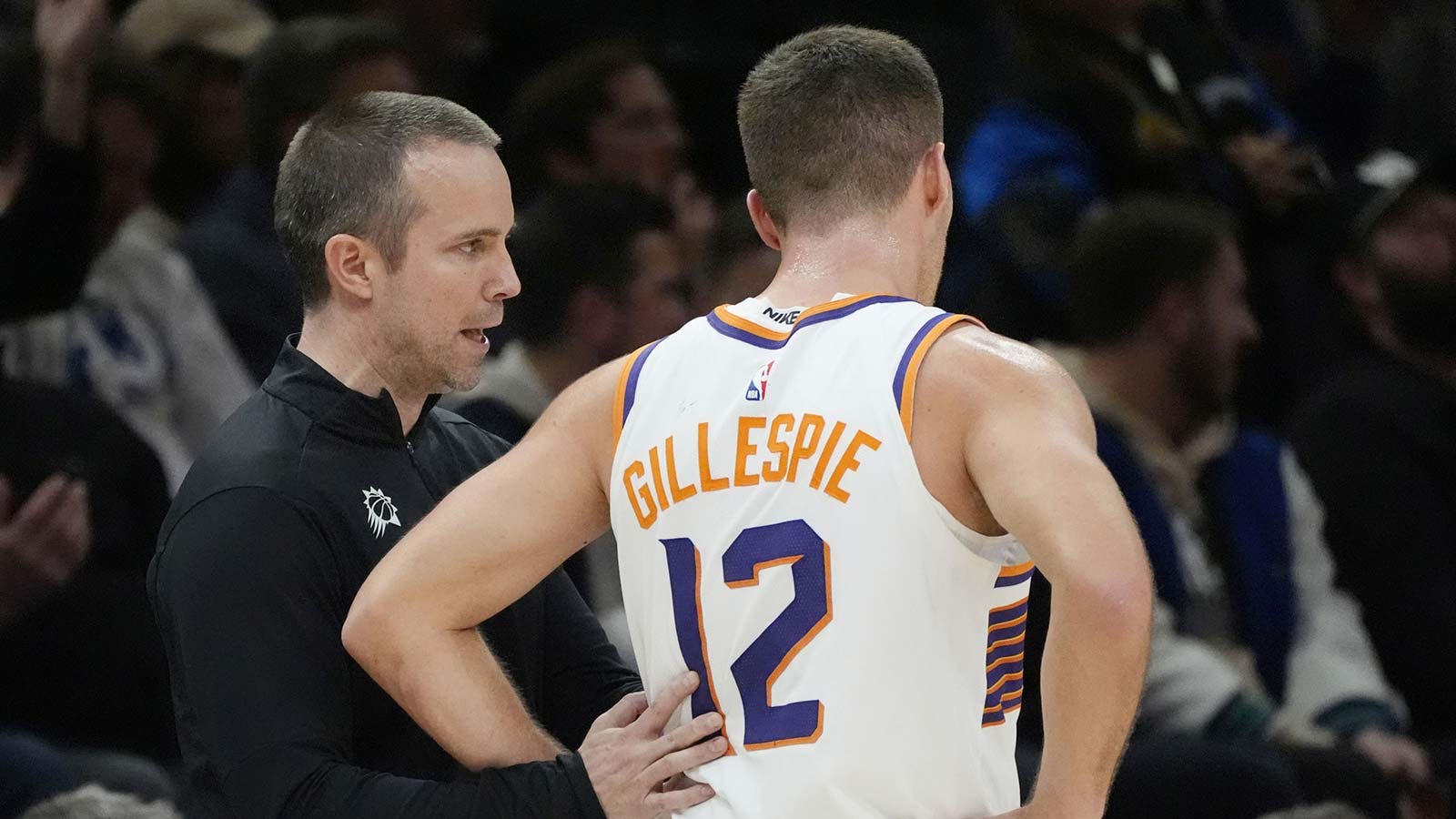 Phoenix Suns head coach Jordan Ott directs guard Collin Gillespie (12) as they play the Minnesota Timberwolves in the third quarter at Target Center.