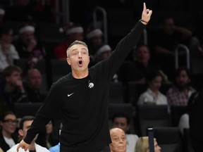 Toronto Raptors head coach Darko Rajakovic reacts during the first half of an NBA basketball game against the Miami Heat, Tuesday, Dec. 23, 2025, in Miami.