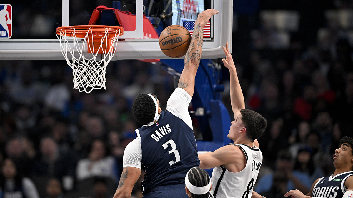 Dallas Mavericks forward Anthony Davis (3) blocks a shot by Brooklyn Nets guard Egor Demin (8) during the first quarter at the American Airlines Center.