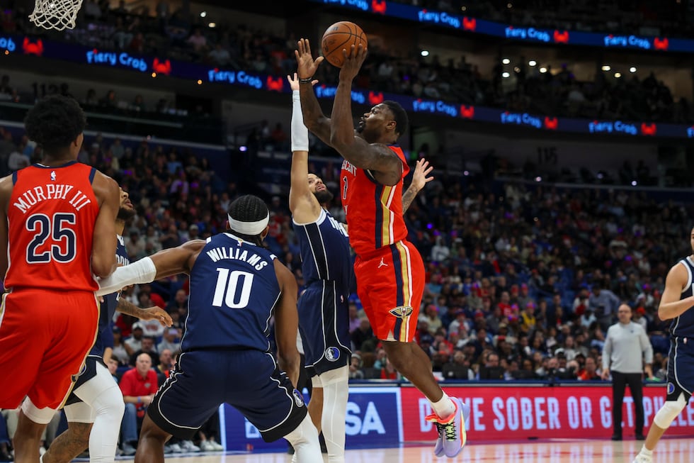 New Orleans Pelicans forward Zion Williamson (1) shoots a layup against Dallas Mavericks...