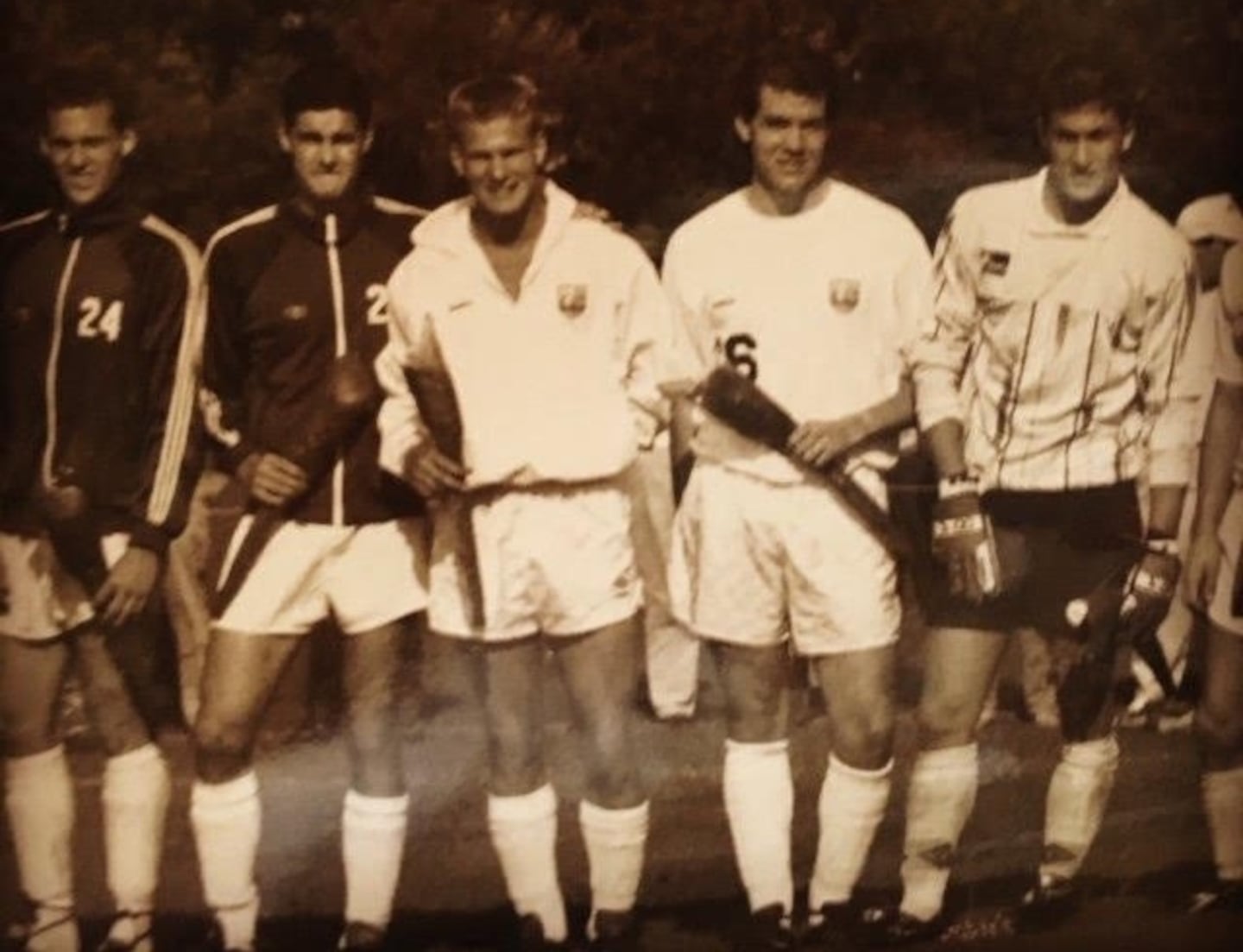 Bill Chisholm (second from left) played soccer at Dartmouth after a standout career at the Brooks School. His teammate, goalkeeper Gregg Lemkau (right), was later hired by the Grousbecks to facilitate the sale of the Celtics.