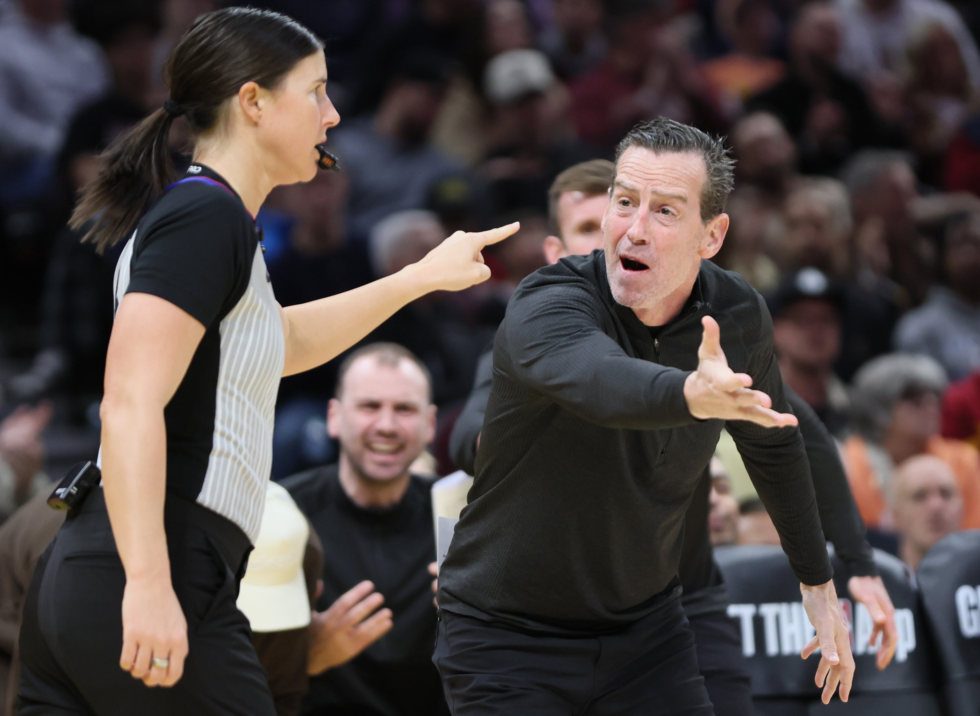 Cleveland Cavaliers head coach Kenny Atkinson questions official Natalie Sago in the second half at Rocket Arena.
