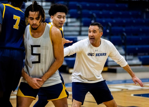 Northern Colorado Bears men's basketball assistant coach and director of performance Brett Cloepfil coaches his players through a drill during a practice at Bank of Colorado Arena on the campus of the University of Northern Colorado in Greeley on Friday, Dec. 19, 2025. (Brice Tucker/Staff Photographer)