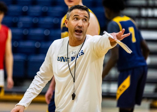 Northern Colorado Bears men's basketball assistant coach and director of performance Brett Cloepfil talks to his players about a drill during a practice at Bank of Colorado Arena on the campus of the University of Northern Colorado in Greeley on Friday, Dec. 19, 2025. (Brice Tucker/Staff Photographer)