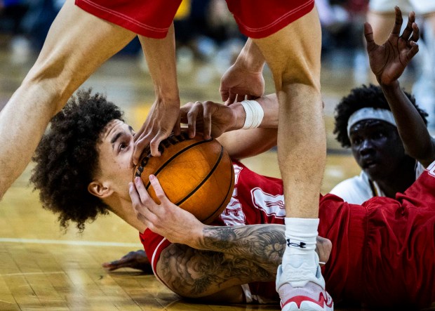 Denver Pioneers' forward Jeremiah Burke (0) hands a recover loose ball up to a teammate during a college basketball game against the Northern Colorado Bears at Bank of Colorado Arena on the campus of the University of Northern Colorado in Greeley on Saturday, Dec. 20, 2025. (Brice Tucker/Staff Photographer)