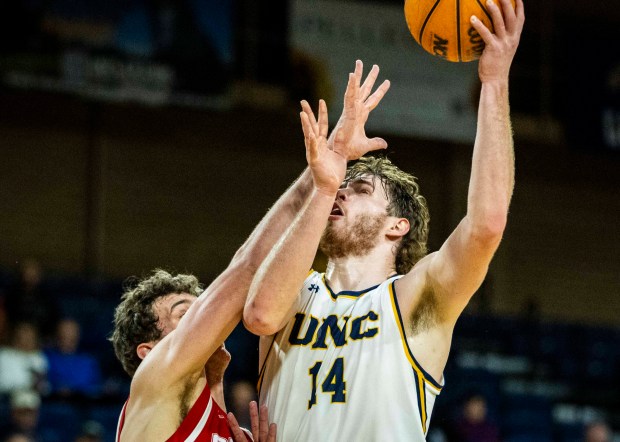 Northern Colorado Bears forward Brock Wisne (14) puts up a shot during a college basketball game against the Denver Pioneers at Bank of Colorado Arena on the campus of the University of Northern Colorado in Greeley on Saturday, Dec. 20, 2025. (Brice Tucker/Staff Photographer)