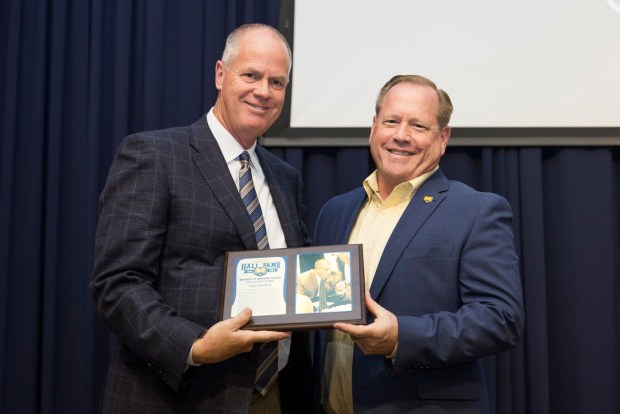 University of Colorado men's basketball coach Tad Boyle, left, stands with University of Northern Colorado athletic director Darren Dunn during Boyle's induction into the UNC Athletics Hall of Fame on Friday, Sept. 13, 2024 at the University Center at UNC in Greeley. Boyle, a Greeley native, coached UNC from 2006-10 in his first Division I head coaching job, turning around the program as it transitioned from Division II. (Courtesy: Woody Myers/University of Northern Colorado).