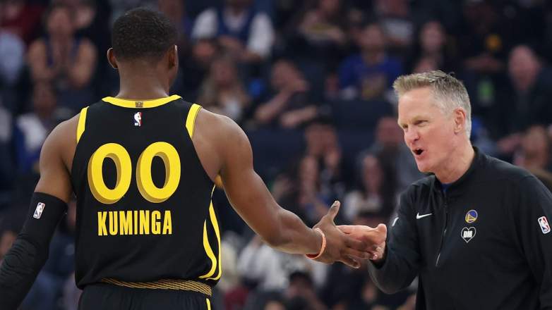 Warriors coach Steve Kerr and Jonathan Kuminga
