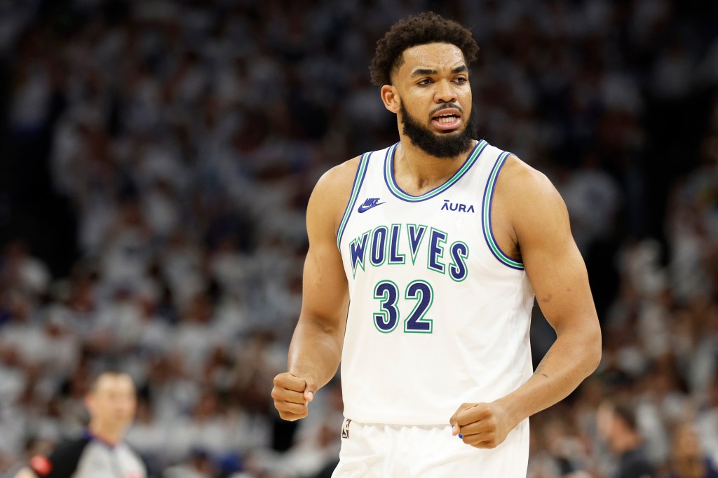 Karl-Anthony Towns #32 of the Minnesota Timberwolves reacts during the fourth quarter against the Dallas Mavericks in Game One of the Western Conference Finals at Target Center on May 22, 2024.