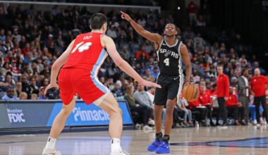 MEMPHIS, TENNESSEE - MARCH 01: De'Aaron Fox #4 of the San Antonio Spurs calls a play during the second half against Zach Edey #14 of the Memphis Grizzlies at FedExForum on March 01, 2025 in Memphis, Tennessee. NOTE TO USER: User expressly acknowledges and agrees that, by downloading and or using this photograph, User is consenting to the terms and conditions of the Getty Images License Agreement. (Photo by Justin Ford/Getty Images)