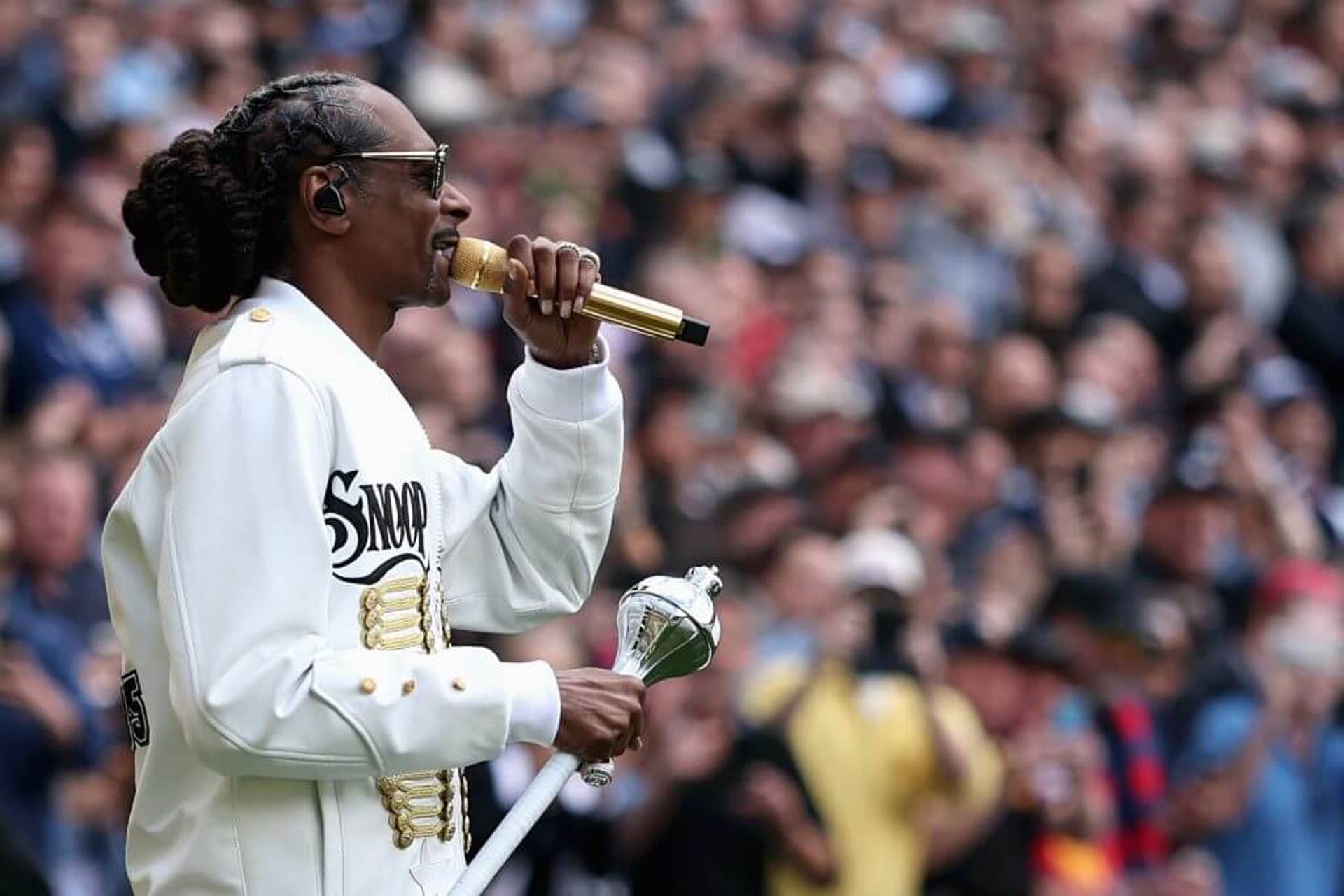 Snoop Dogg performs during the Australian Football League Grand Final match between Geelong Cats and Brisbane Lions in Melbourne.