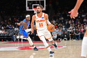 ATLANTA, GA - OCTOBER 25: Trae Young #11 of the Atlanta Hawks drives to the basket as Luguentz Dort #5 of the Oklahoma City Thunder plays defense during the game on October 25, 2025 at State Farm Arena in Atlanta, Georgia.