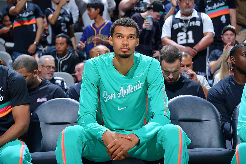 SAN ANTONIO, TX - NOVEMBER 12: Victor Wembanyama #1 of the San Antonio Spurs looks on before the game against the Golden State Warriors on November 12, 2025 at the Frost Bank Center in San Antonio, Texas. NOTE TO USER: User expressly acknowledges and agrees that, by downloading and or using this photograph, user is consenting to the terms and conditions of the Getty Images License Agreement. Mandatory Copyright Notice: Copyright 2025 NBAE (Photos by Michael Gonzales/NBAE via Getty Images)