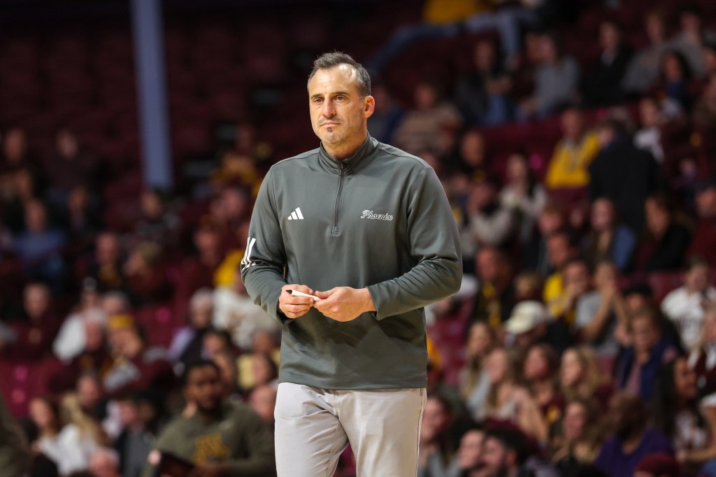 Head Coach Doug Gottlieb of the Green Bay Phoenix looks on during the second half at Williams Arena on November 15, 2025 in Minneapolis, Minnesota.