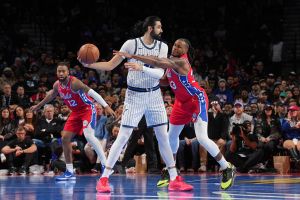 PHILADELPHIA, PA - NOVEMBER 25: Goga Bitadze #35 of the Orlando Magic handles the ball as Jabari Walker #33 of the Philadelphia 76ers plays defense during the 2025-26 NBA Emirates Cup on November 25, 2025 at the Wells Fargo Center in Philadelphia, Pennsylvania NOTE TO USER: User expressly acknowledges and agrees that, by downloading and/or using this Photograph, user is consenting to the terms and conditions of the Getty Images License Agreement. Mandatory Copyright Notice: Copyright 2025 NBAE (Photo by Jesse D. Garrabrant/NBAE via Getty Images)