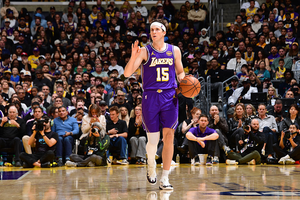 LOS ANGELES, CA - NOVEMBER 28: Austin Reaves #15 of the Los Angeles Lakers handles the ball during the game against the Dallas Mavericks during a 2025-26 Emirates NBA Cup on November 28, 2025 at Crypto.Com Arena in Los Angeles, California. NOTE TO USER: User expressly acknowledges and agrees that, by downloading and/or using this Photograph, user is consenting to the terms and conditions of the Getty Images License Agreement. Mandatory Copyright Notice: Copyright 2025 NBAE (Photo by Adam Pantozzi/NBAE via Getty Images)