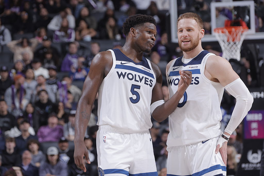 SACRAMENTO, CA - NOVEMBER 24: Anthony Edwards #5 and Donte DiVincenzo #0 of the Minnesota Timberwolves talk during the game against the Sacramento Kings on November 24, 2025 at Golden 1 Center in Sacramento, California. NOTE TO USER: User expressly acknowledges and agrees that, by downloading and or using this photograph, User is consenting to the terms and conditions of the Getty Images Agreement. Mandatory Copyright Notice: Copyright 2025 NBAE (Photo by Rocky Widner/NBAE via Getty Images)
