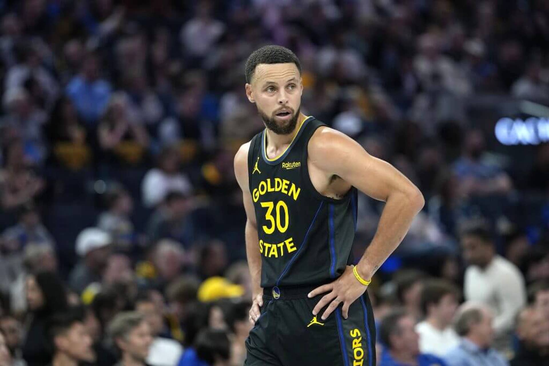 Stephen Curry of the Golden State Warriors looks on against the Houston Rockets in the second quarter during the 2025-26 Emirates Cup at Chase Center on November 26, 2025