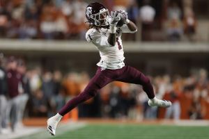 AUSTIN, TEXAS - NOVEMBER 28: Mario Craver #1 of the Texas A&M Aggies catches a pass for a first down against the Texas Longhorns during the first quarter at Darrell K Royal-Texas Memorial Stadium on November 28, 2025 in Austin, Texas. (Photo by Alex Slitz/Getty Images)