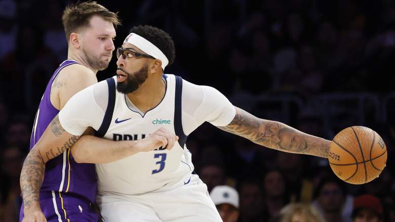 LOS ANGELES, CALIFORNIA - NOVEMBER 28: Luka Doncic #77 of the Los Angeles Lakers guards Anthony Davis #3 of the Dallas Mavericks during the third quarter at Crypto.com Arena on November 28, 2025 in Los Angeles, California. NOTE TO USER: User expressly acknowledges and agrees that, by downloading and or using this photograph, User is consenting to the terms and conditions of the Getty Images License Agreement. (Photo by Ronald Martinez/Getty Images)