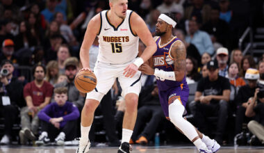 PHOENIX, ARIZONA - NOVEMBER 29: Nikola Jokic #15 of the Denver Nuggets posts up on Jordan Goodwin #23 of the Phoenix Suns during the second half at Mortgage Matchup Center on November 29, 2025 in Phoenix, Arizona. NOTE TO USER: User expressly acknowledges and agrees that, by downloading and or using this photograph, User is consenting to the terms and conditions of the Getty Images License Agreement. (Photo by Chris Coduto/Getty Images)