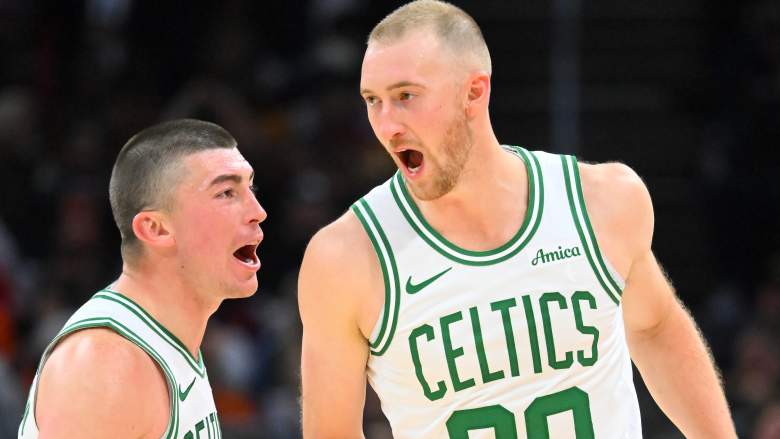 CLEVELAND, OHIO - NOVEMBER 30: Payton Pritchard #11 and Sam Hauser #30 of the Boston Celtics celebrate during the third quarter against the Cleveland Cavaliers at Rocket Arena on November 30, 2025 in Cleveland, Ohio. The Celtics defeated the Cavaliers 117-115. NOTE TO USER: User expressly acknowledges and agrees that, by downloading and or using this photograph, User is consenting to the terms and conditions of the Getty Images License Agreement. (Photo by Jason Miller/Getty Images)