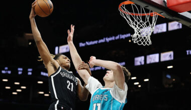 NEW YORK, NEW YORK - DECEMBER 01: Noah Clowney #21 of the Brooklyn Nets goes to the basket as Ryan Kalkbrenner #11 of the Charlotte Hornets defends during the second half at Barclays Center on December 01, 2025 in the Brooklyn borough of New York City. The Nets won 116-103. NOTE TO USER: User expressly acknowledges and agrees that, by downloading and or using this photograph, User is consenting to the terms and conditions of the Getty Images License Agreement. (Photo by Sarah Stier/Getty Images) (Photo by Sarah Stier/Getty Images)