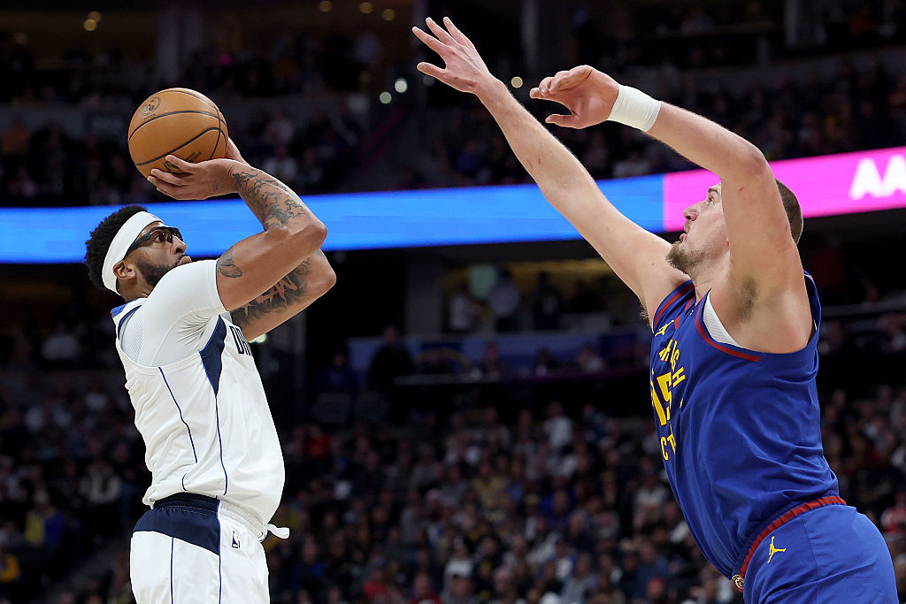 DENVER, COLORADO - DECEMBER 01: Anthony Davis #3 of the Dallas Mavericks puts up a shot against Nikola Jokic #15 of the Denver Nuggets in the first quarter at Ball Arena on December 01, 2025 in Denver, Colorado. NOTE TO USER: User expressly acknowledges and agrees that, by downloading and or using this photograph, User is consenting to the terms and conditions of the Getty Images License Agreement. (Photo by Matthew Stockman/Getty Images)
