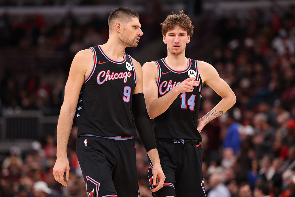 CHICAGO, ILLINOIS - DECEMBER 03: Nikola Vucevic #9 of the Chicago Bulls talks with Matas Buzelis #14 against the Brooklyn Nets during the second half at the United Center on December 03, 2025 in Chicago, Illinois. NOTE TO USER: User expressly acknowledges and agrees that, by downloading and or using this photograph, User is consenting to the terms and conditions of the Getty Images License Agreement. (Photo by Michael Reaves/Getty Images)